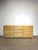 This distinctive vintage sideboard is crafted in bamboo and immediately stands out thanks to its sculpted, wave-patterned...