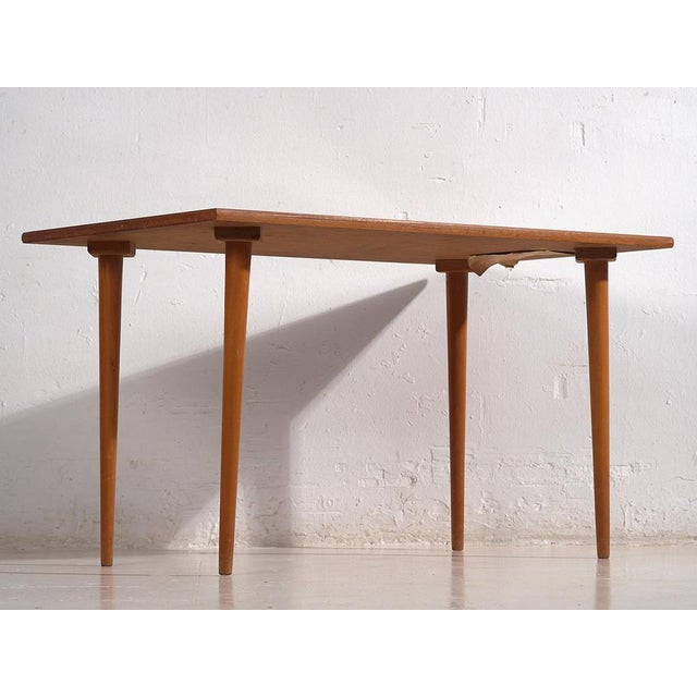 Solid wood retro style table (c.1960) Approximate age: 60 years Material: Solid wood Our vintage table is a unique piece...