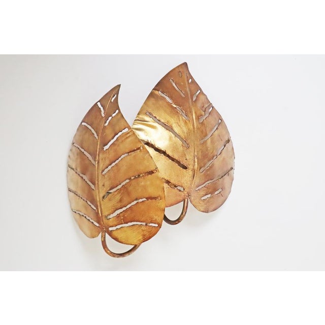 This lovely Monstera leaf lamp is a real gem for any wall. This lamp is a real beauty, with its two leaves coming together...