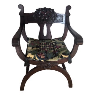 1920s Renaissance Revival Savonarola-Style Carved Wooden Chair With a Lion Motif For Sale
