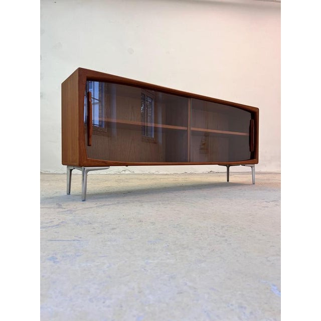 This Dyrlund sideboard is an exceptional example of 1960s Danish craftsmanship, given a completely new, contemporary look...