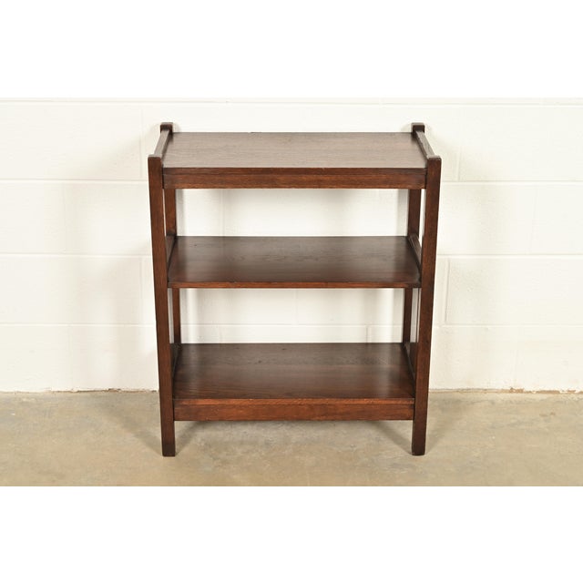 A gorgeous antique Mission or Arts & Crafts period quarter sawn oak bookcase or magazine stand By Lifetime Furniture USA,...