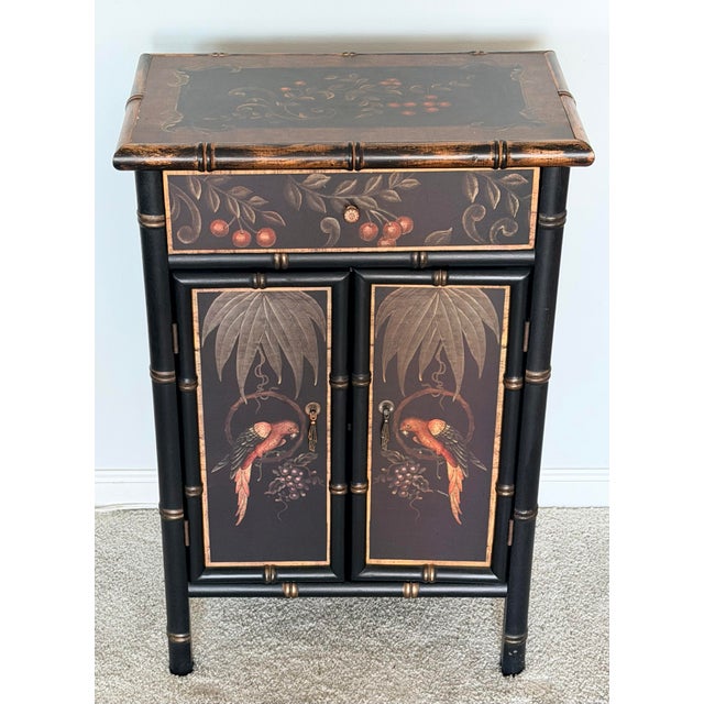 Sweet chinoiserie style faux bamboo cabinet. Useful piece for a variety of places in your home. One drawer and one...