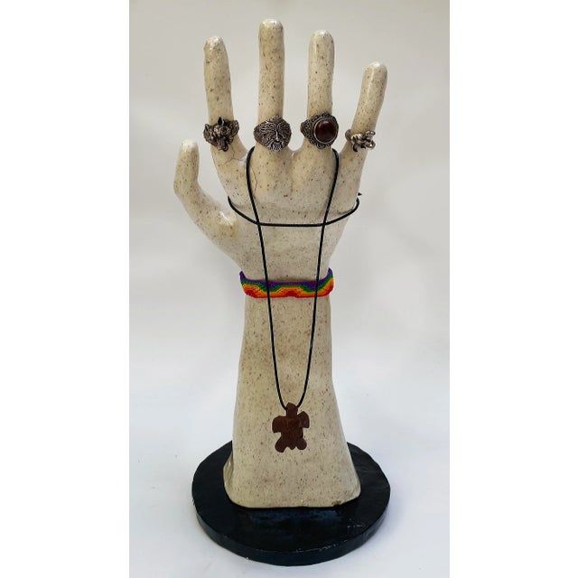 Hand Built Sculptural Glazed Ceramic Hand Jewelry Display Offered for sale is a handmade functional art ceramic hand that...