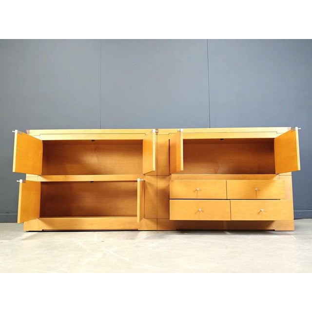 Exceptional sideboard designed by Chi Wing Lo for Giorgetti. The 'Oli' sideboard is made out of high quality maple wood as...