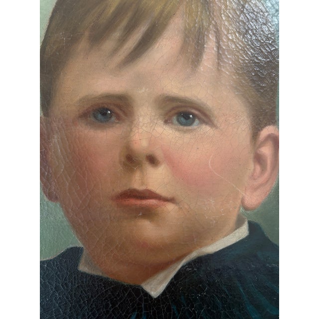 This is a rare late 19th century portrait of young boy has had a restoration probably in the 1960s. It looks like the...