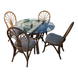 Rattan/Bamboo Dining Table With Glass and Four Rattan/Bamboo Chairs.