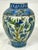 Beautiful Persian antique hand painted with figures, birds and flowers polychrome glazed earthenware vase. Late 19th-early...