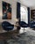 A stylish and matching pair of fully refurbished mid-century modern swivel lounge armchairs, featuring a distinctive...