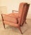 Rare walnut lounge chair by J S Clingman for Widdicomb circa 1960. Features dowel rod back, turned arms, and brass sabots....
