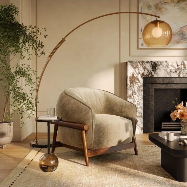 Sink into the plush comfort of the Piedmont Upcycled Chenille Accent Chair. Upholstered in a richly textured chenille made...