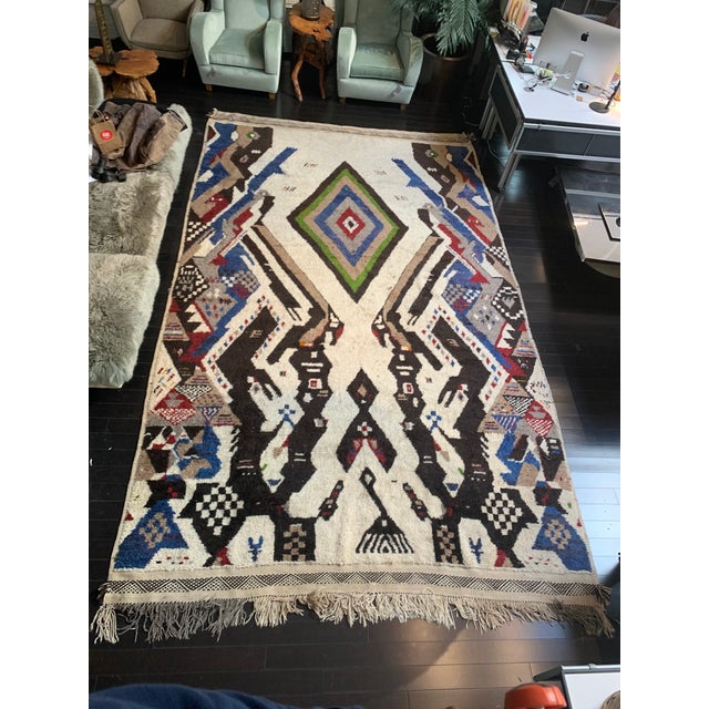 A gorgeous, large, stylish Moroccan area rug.