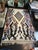A gorgeous, large, stylish Moroccan area rug.