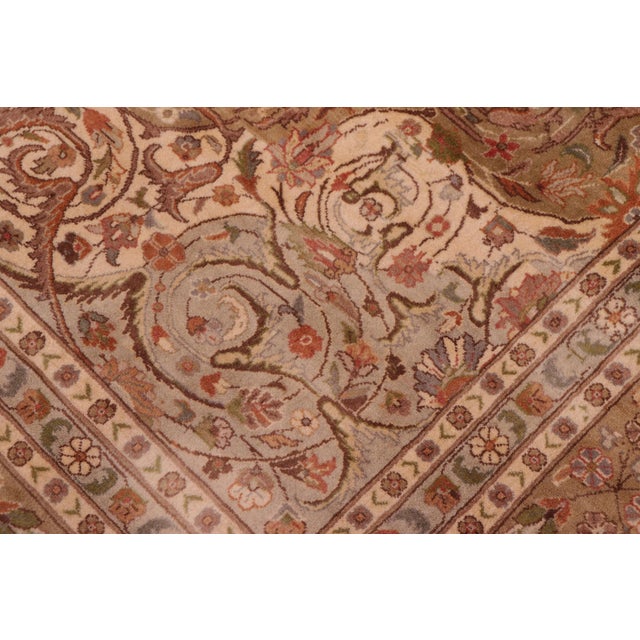 Designed with mesmerizing intricacy and gorgeous color palette, this hand-knotted masterpiece demonstrates the beauty and...