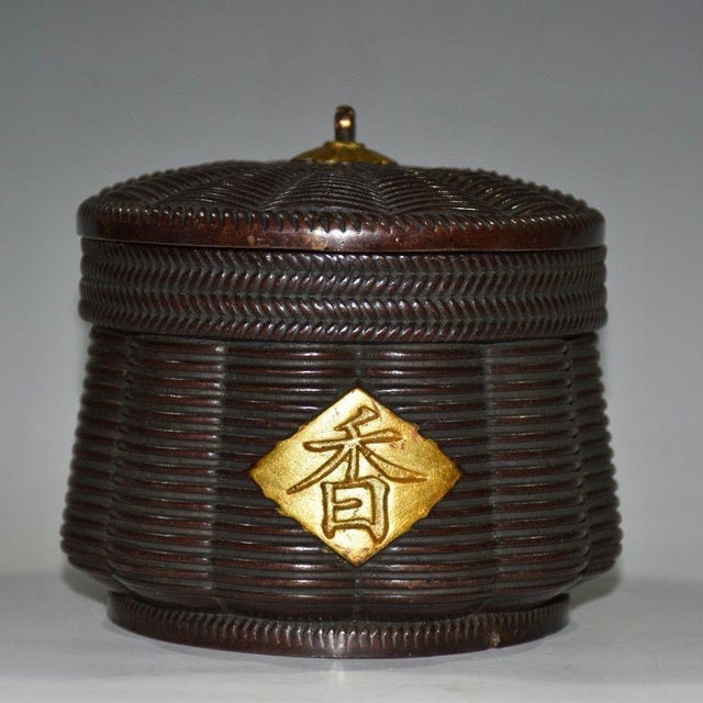 This charming vintage tea caddy is a beautiful example of Chinese-inspired decorative arts. The jar features a distinctive...