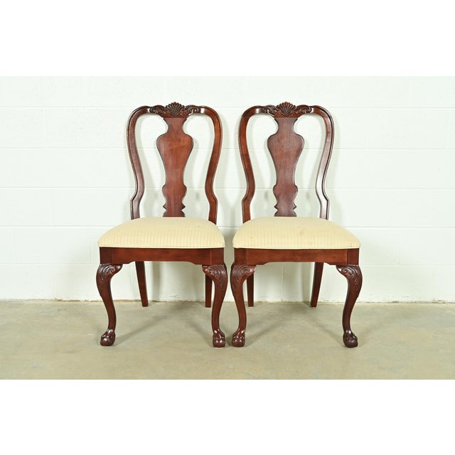An outstanding pair of Chippendale or Georgian style side chairs or dining chairs By Thomasville USA, Circa 1980s Carved...