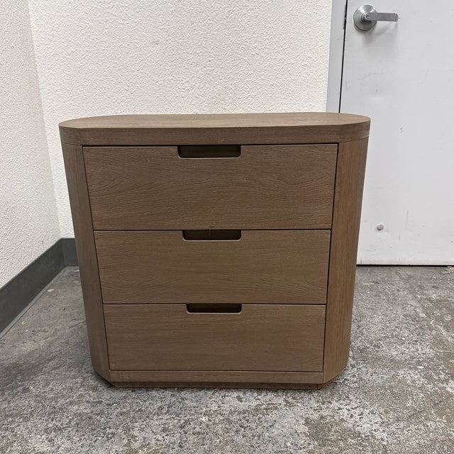 Design Plus Gallery presents a Palmer Nightstand from Brownstone Furniture. The Palmer design has a rounded case, three...