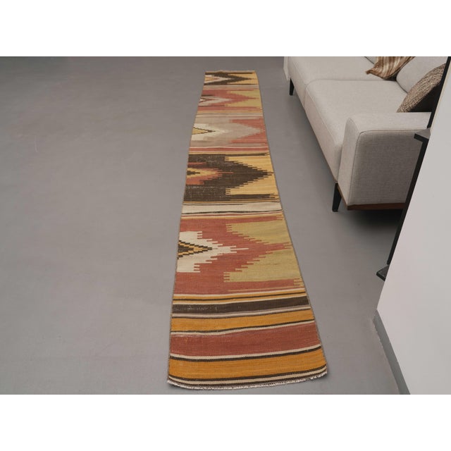 Vintage Hand-Knotted area rug is a semi-antique vintage area rug. The '70s Eastern region of Anatolia's unique rug is...