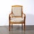 This elegant and sculptural pair of Biedermeier arm chairs were realized in Austria circa 1880. Realized in a stunning...