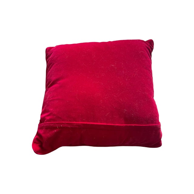 Vintage holiday decor pillow with needlepoint front and red velvet back depicting an old fashioned Santa Claus/St....