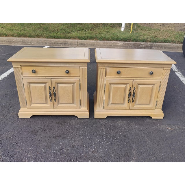a pair of Chic one drawer nightstands or side tables by Bernhardt from their Atrium Court Collection.