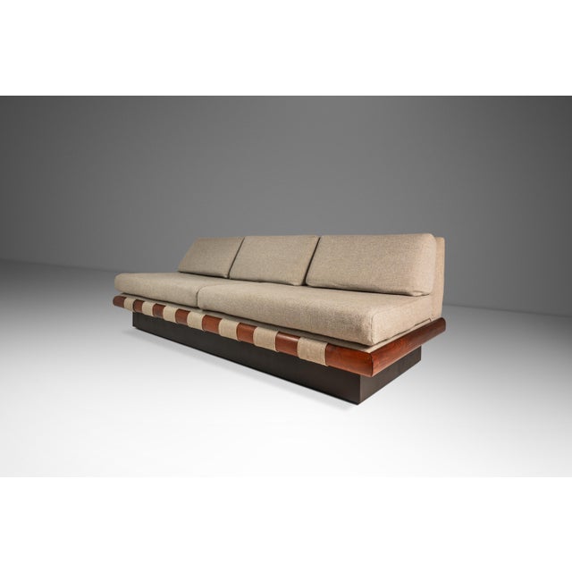 Designed by the incomparable Adrian Pearsall, this iconic platform sofa is the epitome of functional art. Audacious in...