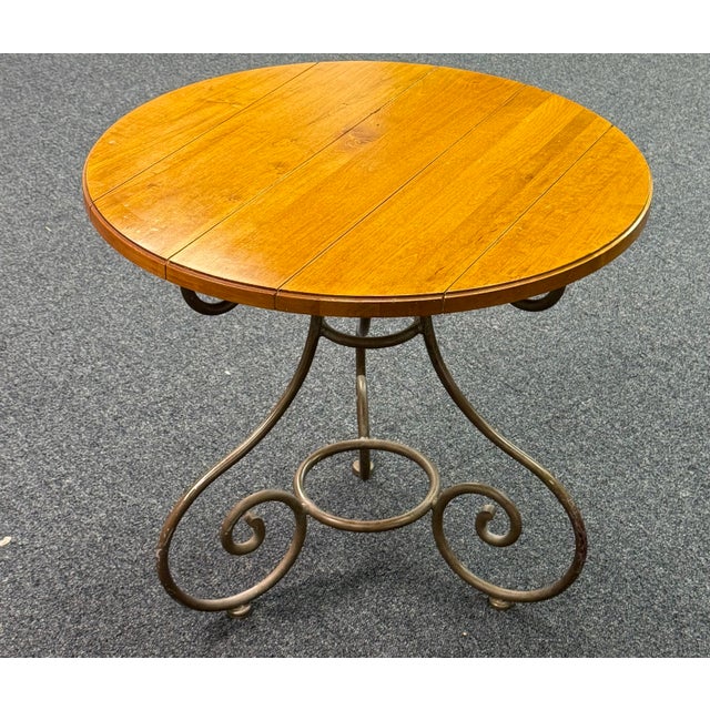 Very nice Ethan Allen iron and wood end table from the Legacy Collection. The beautiful maple top gives the appearance of...