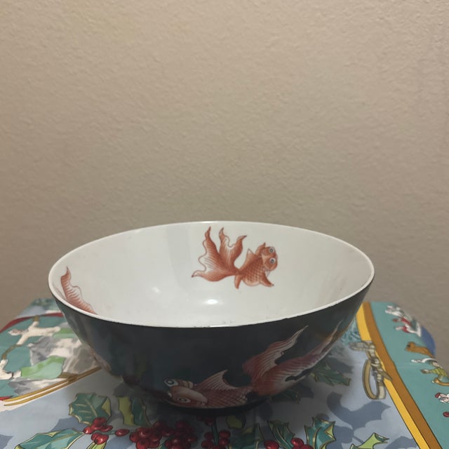 This striking Asian-inspired bowl features a dramatic deep midnight black finish, serving as a bold backdrop for...