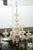 Here we have an ornate Venetian glass chandelier with elaborate floral ornamentation and ribbed glass arms. Handcrafted...
