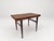 This is a side table designed by Johannes Andersen and produced by CFC Silkeborg in Denmark during the 1960s. The piece is...