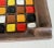 Vintage 1960s Aldo Londi Bitossi Multi-Color Square Ceramic Ashtray. Great ashtray with two cigarette rests. Made in...