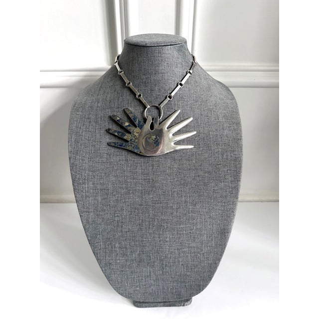 A bespoken Mexican Modern silver necklace circa 1950s from Taxco, Mexico and crafted by William Spratling (1900-1967), an...