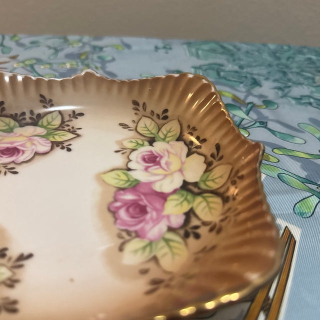 Perfect as a vanity trinket tray, soap dish, candy bowl, or for display in a collection of fine Japanese porcelain.