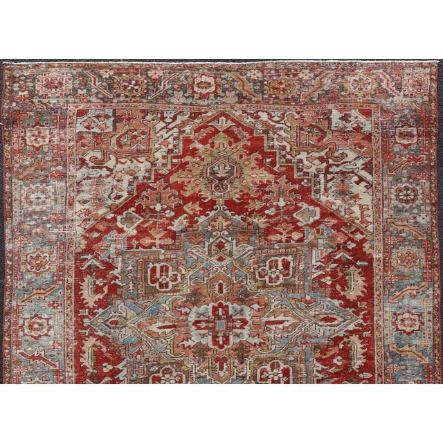 Persian Early 20th Century Antique Persian Heriz Rug With Geometric Medallion Design in Red & Soft Colors For Sale - Image 3 of 12