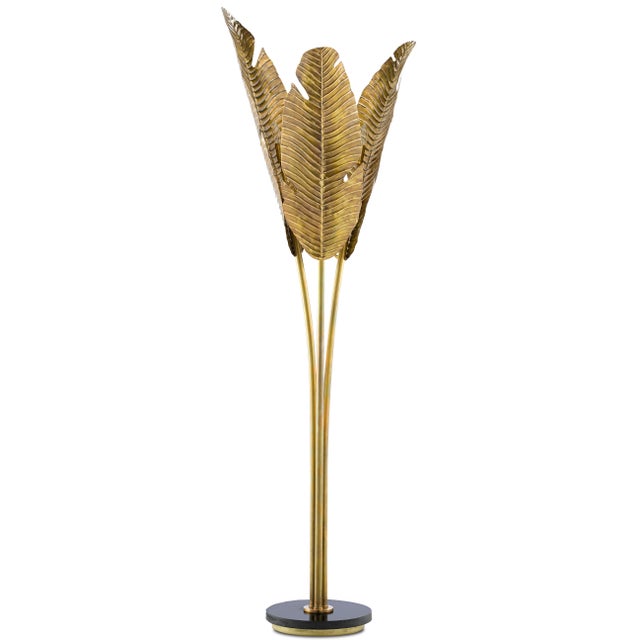 The Tropical Floor Lamp is made of brass in a vintage brass finish with life-like leaves rising from its base to imply...
