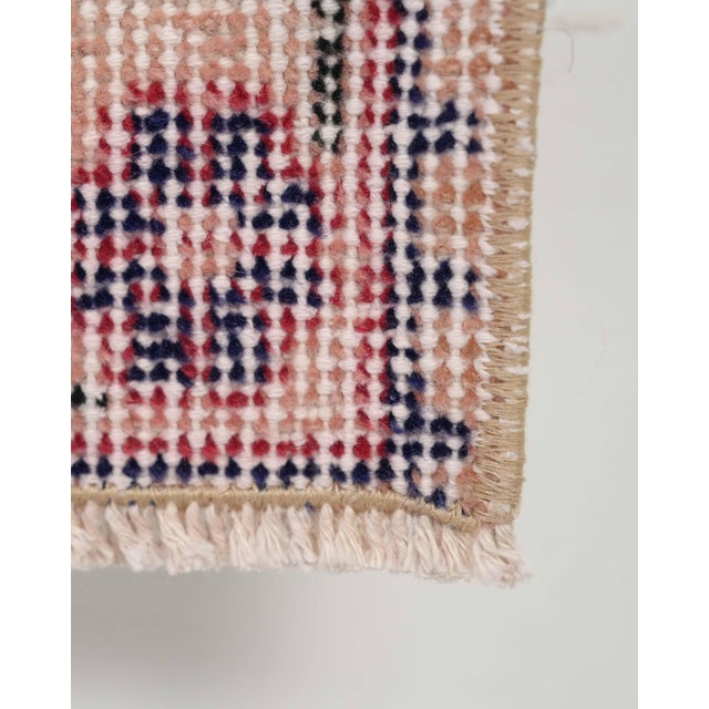 Vintage Turkish Hand-Knotted vintage rug is a semi-antique vintage Area rug.'70s Eastern region of Turkey's unique rug is...