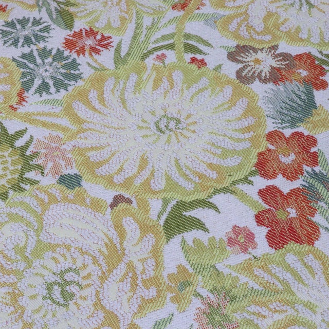 Drexel Heritage curved loveseat with original brocade upholstery in a poppy garden print featuring rich marigolds, greens,...