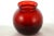 Ruby red four inch vintage glass ball vase or catchall with a slightly flared rim. Simply a beautiful vintage addition to...