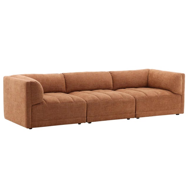 Long basketweave soft upholstered sofa in a warm terra cotta finish. Rounded arms and back and channel tufting on seats....