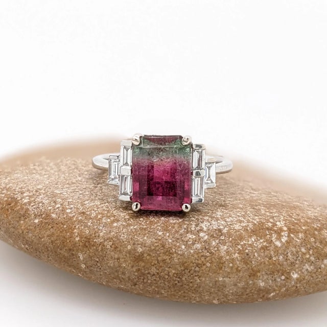 This ring features a beautiful pink and green watermelon Tourmaline with gorgeous saturated hues. It is set with sparkling...