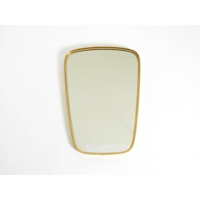 Two beautiful original Mid-Century Modern wall mirrors with heavy brass frames. Typical minimalist 1950s design. Very...