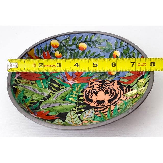 Offering a beautiful vintage hand painted porcelain and pewter bowl made for Neiman Marcus, circa 1970s. It is signed on...