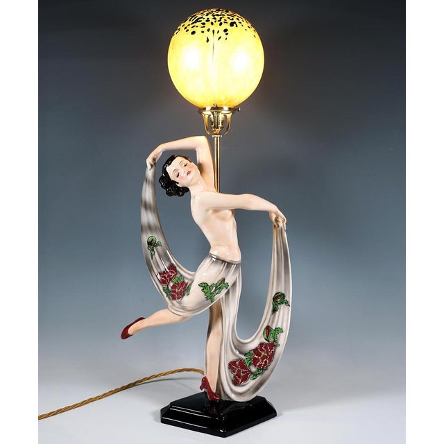 Exquisite rare ceramic figurine and lamp of the early 1940s: striking young dancer with chin-length black curls, dressed...
