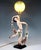 Exquisite rare ceramic figurine and lamp of the early 1940s: striking young dancer with chin-length black curls, dressed...