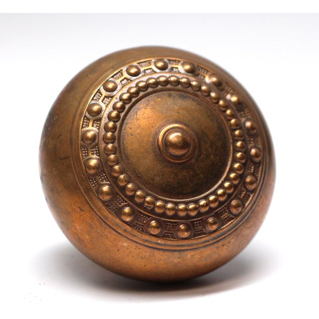 This concentric knob was made by Corbin in the 1905 catalog. It is part of the M-10900 Como group. This knob takes a 0.375...