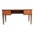 A French 20th century leather-topped mahogany writing desk, designed in the Directoire taste for refined proportions &...