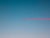 “To the Moon and Back” captures the fleeting beauty of a plane gliding across the sky at dusk, set against a vast and...