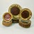 A wonderful dinnerware set from the 1980s featuring a studio pottery lava drip design on brown glazed pottery. The set has...