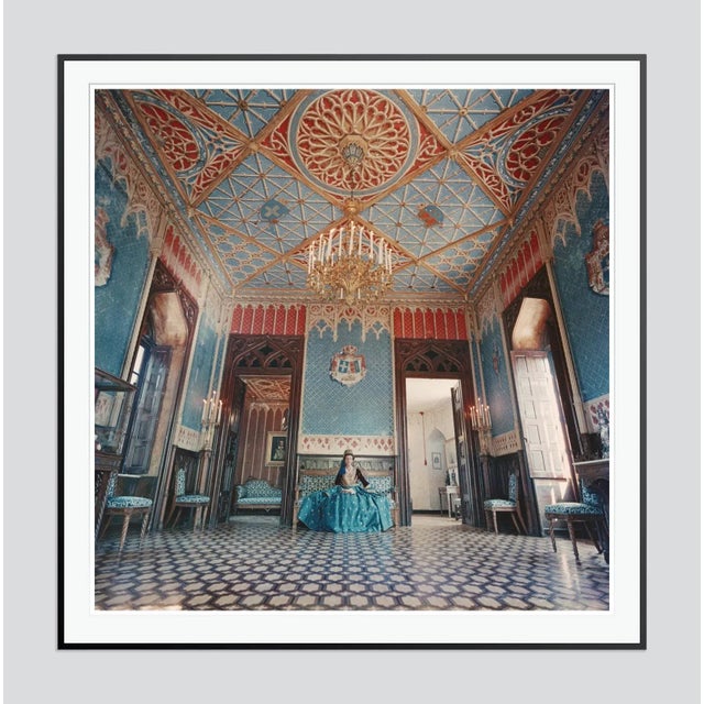 Jean Serpieri' by Slim Aarons Open Edition Madame Jean Serpieri sits in the ballroom of the Tour La Reine near Athens,...