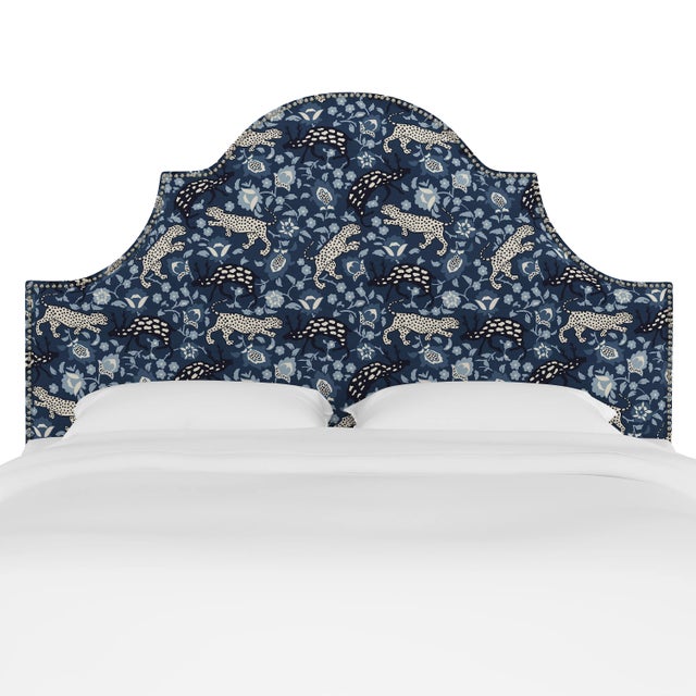 Classic curves wrapped in smooth upholstery, then accented with elegant ornamental nailheads, gives this Upholstered...